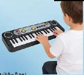 Electronic Keyboard With Music